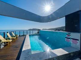 Confortável Loft com Vista para o Mar - Condomínio com Piscina