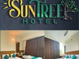Sun Tree Hotel, מלון בKampong Kerayong