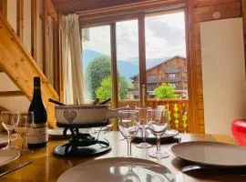 Duplex chaleureux près du Grand Massif Express avec balcon et garage privé - FR-1-624-33