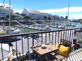Détente et vue sur le port au Pouliguen