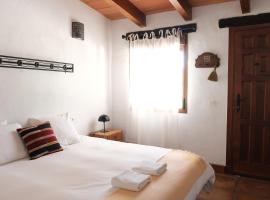 The Wild Olive Andalucía Palma Guestroom，卡薩雷斯的農莊