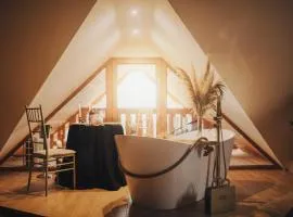 Apartament z wanną wolnostojącą