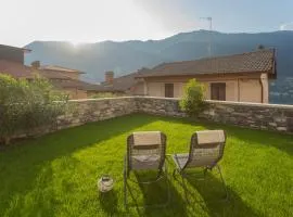 Pozzo Vertical Apartment with garden and parking by Rent All Como