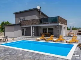 Modern villa with private pool, terrace and fenced garden