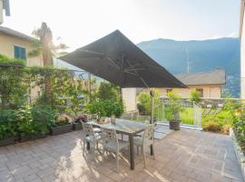 Pozzo Vertical Apartment with garden and parking by Rent All Como, hotel in Torno