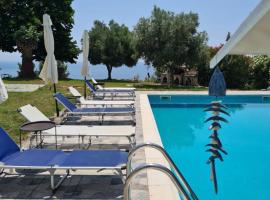 Greco Paradise Suites - ADULT ONLY, ваканционно жилище на плажа в Неа Скиони