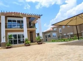 Beautiful Villa with stunning Serena golf course & lake views in Mirembe Villas Kigo