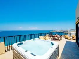 Islet Promenade Seafront Penthouse with breathtaking seaviews and private hot tub on the large terrace by Getawaysmalta