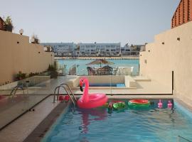Rose Beach Villas, Resort in Durrat Al-Arus