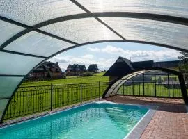 Folk Resort Domki i Apartamenty