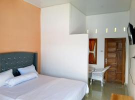 RedDoorz @ Sihole Paradise Inn Parbaba: Sinapuran şehrinde bir otel