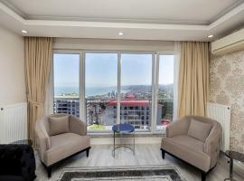 Trabzon Sea View Apartment, hotel di Yomra