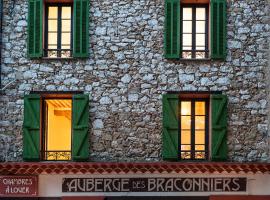 Auberge des braconniers، فندق في Ampus