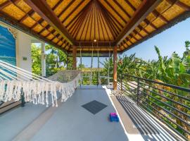 TropicalVibes 4BR RiceField, Ocean & Volcano view Canggu !, hotel v destinaci Munggu