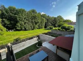 Maison terrasse au bord de l'eau