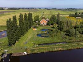 De Twee Zwanen, hotel en Delfstrahuizen