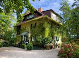 Strandvilla Hubertus Boltenhagen - Ferienwohnungen Apartment mit Parkplatz WLAN Küche Garten Grillplatz Waldbaden