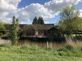 Haus "Am Kanal", renta vacacional en Krummhörn