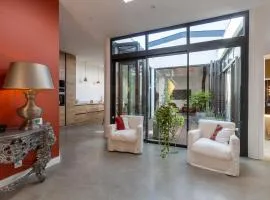 Loft lumineux haut de gamme avec patio privé