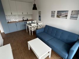 Apartament za wydmami, hotel na praia em Rowy