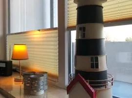 Ferienwohnung Sandküste mit Strandkorb & Indoor Spielplatz