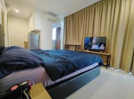 Kozi Square Studio, hotel in Kuching