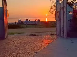 Praia Seca, 10 pessoas, em frente à lagoa do Tomé