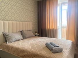 Комфортабельные - Уютные апартаменты в Костанай Алтын Арман, hotel in Kostanay