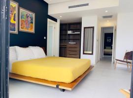 Apt 6ix - Modern and Airy @ Paradise Bay, apartemen di Teluk Montego