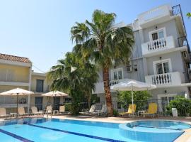 Skalidis Apartments, vakantiewoning aan het strand in Tolo