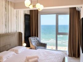 Beach Bliss Apartment in Infinity Beach Resort parking: Mamaia şehrinde bir spa oteli