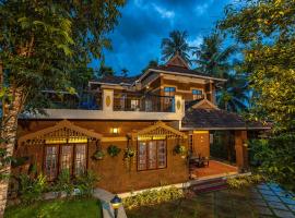 Sukrutham Farmstay, hotel i Thrissur