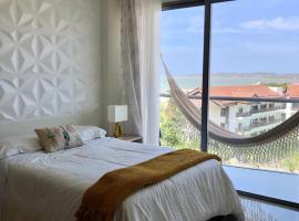 Apartamento con vista al mar en condominio de lujo, hotel con alberca en La Siriaca