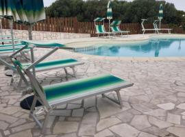 agriturismo gli olivastri -appartamento sole mare con piscina ,solarium e vista mare,climatizzatore ,wifi、アリエントゥのホテル