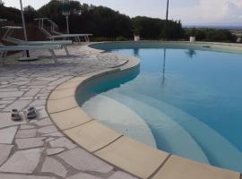 agriturismo gli olivastri appartamento corbezzolo con piscina e vista mare,climatizzatore,wifi, hotel v destinaci Aglientu