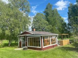 Summer Cottage with boat, cabaña o casa de campo en Hudiksvall