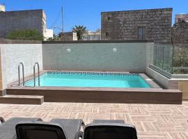 Ta' Cikku Farmhouse, hotel en Xagħra
