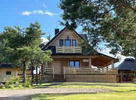 Mazury "Willa Ślimakowo" w Pasymiu - jacuzzi, sauna, pomost, łódka, rower wodny，帕瑟姆的飯店