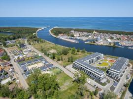Wellness & SPA Resort Dziwnów Riverfront Apartments with AC & Parking by Renters, hotell i Dziwnów