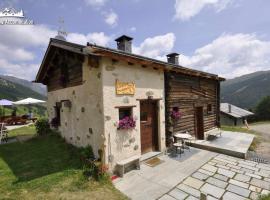 Mountain Chalet Scoiattolo, cabaña o casa de campo en Livigno