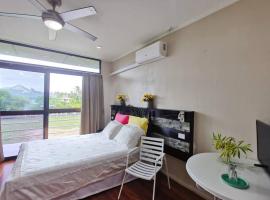 Master Bedroom in Shared Cozy River View Pool Apartment, holiday rental in Nadi