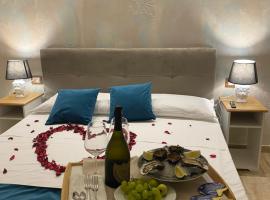 Sensoria Naxos Suites, hotel with hot tubs in Giardini Naxos