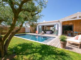 Villa d'architecte avec Piscine chauffée et jardin，位于里夫杜海滩的酒店