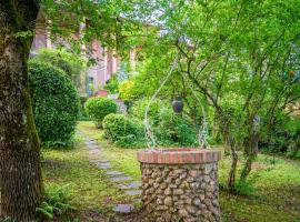 Monteriggioni Charming House with Garden&Parking!, hotel económico en Tognazza