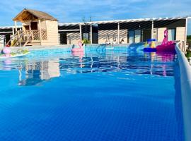 Resto domki letniskowe, holiday park in Sarbinowo