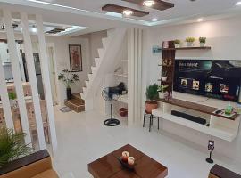 Cozy Transient house in Calapan City., hotell i Calapan
