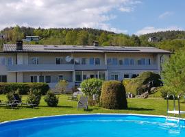 Pension Pfefferdohle, παραλιακή κατοικία σε Velden am Wörthersee