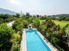 Vacation Flat w Pool Garden Patio BBQ in Mugla, chata v destinácii Mugla