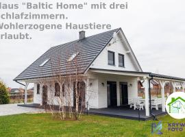 Dom Wakacyjny Baltic Home & Dom Baltic Home Garden Inn, parkolóval rendelkező hotel Zastań városában