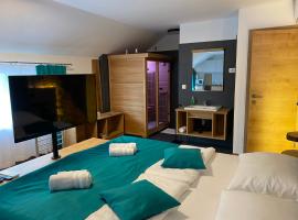 Apartments with Private Saunas - WELLNESS Gobi, hotel con tinas de hidromasaje en Podčetrtek